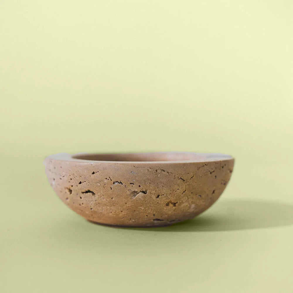 Beige travertine ashtray outdoor