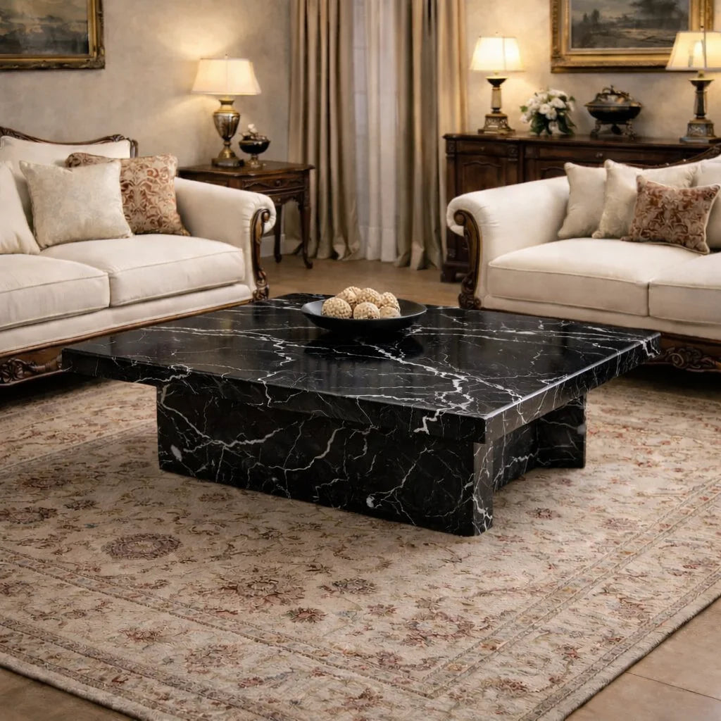Luxurious living room with marble coffee table, beige sofas, and decorative lamps.