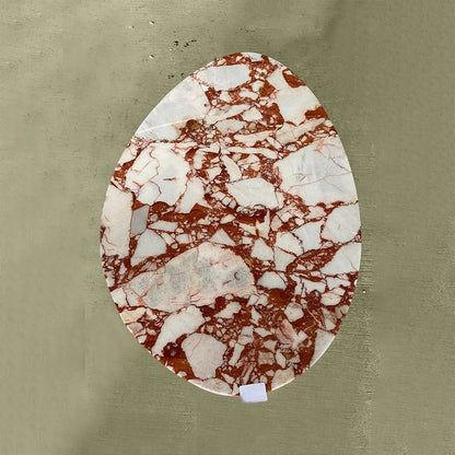 polished red marble oval coffee table
